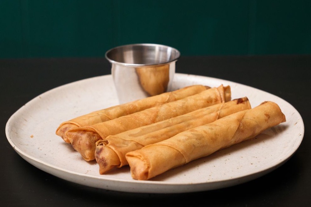 Filipino lumpia spring rolls with dipping sauce