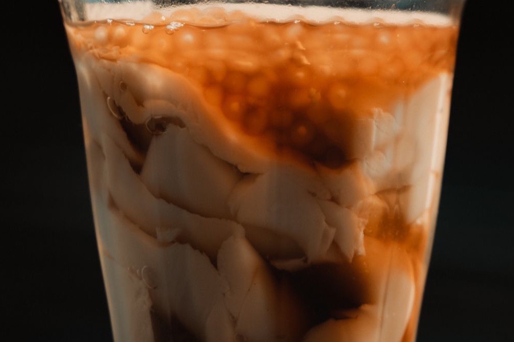 Filipino taho, warm silken tofu with syrup and tapioca pearls